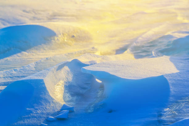 istock closeup blue frozen ice in a sunlight 927329078