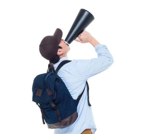 istock Handsome Korean American Male Student Yelling With Megaphone 927336434