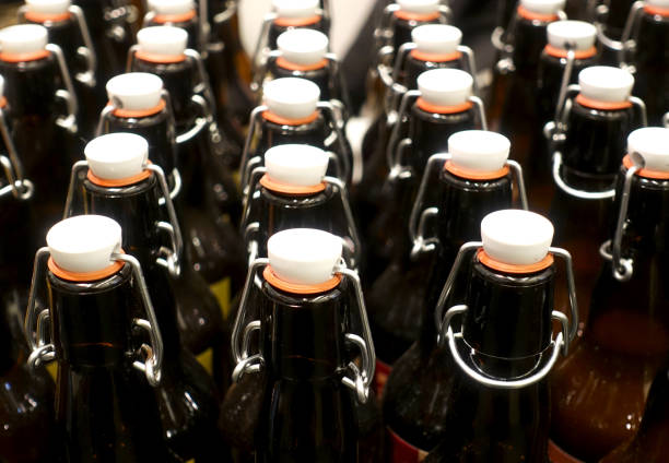 istock Rows of bottles with lids 927339656