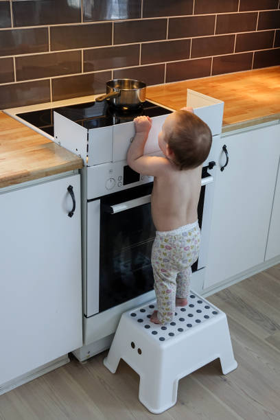 istock Child safety at the stove 927348170
