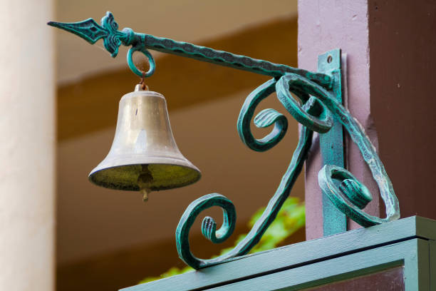 istock Vintage hanging brass bell. 927352390