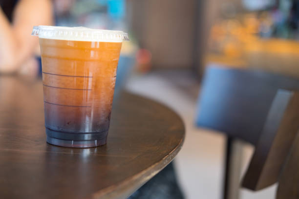 istock Iced black coffee for refreshing on wood table 927362166