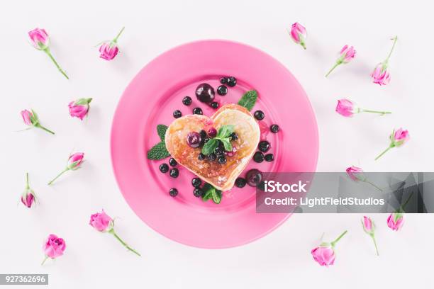 Top View Of Heart Shaped Pancake And Pink Roses Isolated On White Valentines Day Concept Stock Photo - Download Image Now