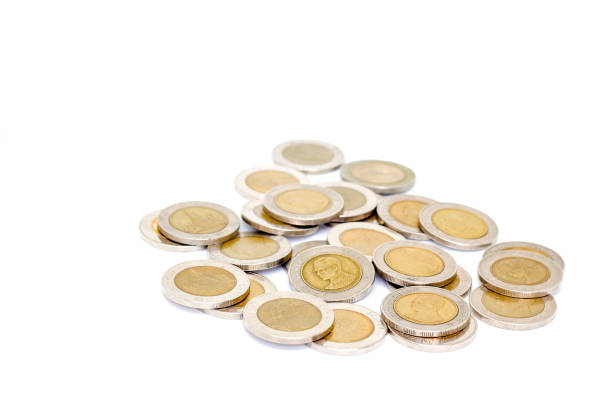 istock Coin Thai baht at the pile on a white background. 927363612