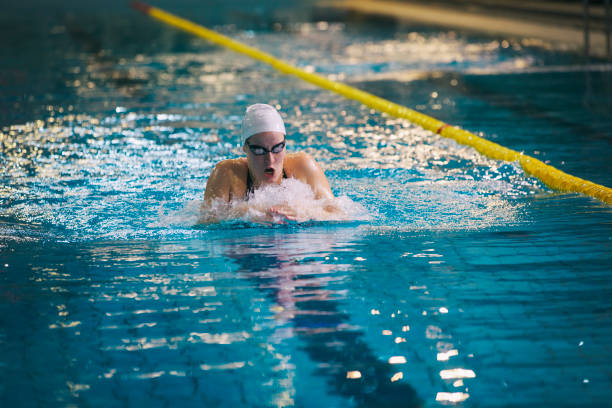 istock Female swimmer -  breaststroke style 927363928