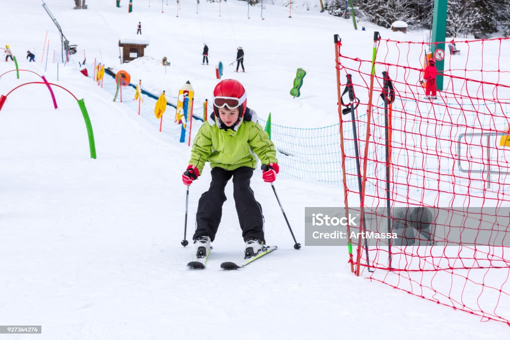 Boy and Girl Ski School Little boy practicing skiing on ski lesson Skiing Stock Photo