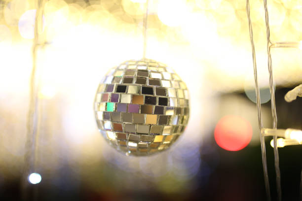 istock mirror disco ball hang on ceiling entrance tunnel with many small party light background, entertainment and enjoy night life star concert. 927368906