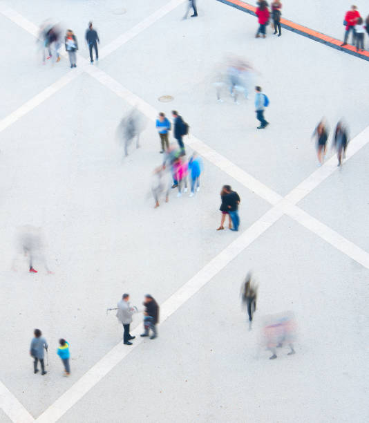 istock People motion blur, aerial view 927372238