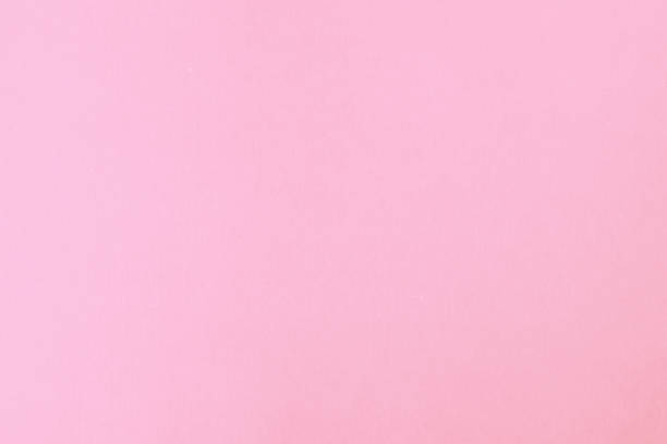 istock Paper texture delicate pastel pink color, abstract background 927378332