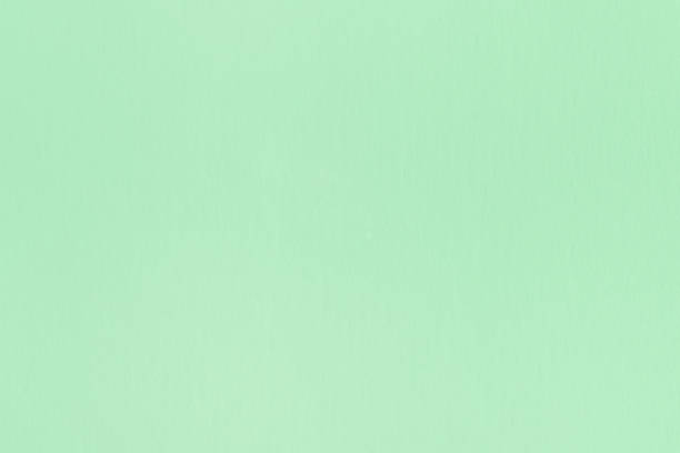 istock Paper texture delicate pastel green color, abstract background 927378654