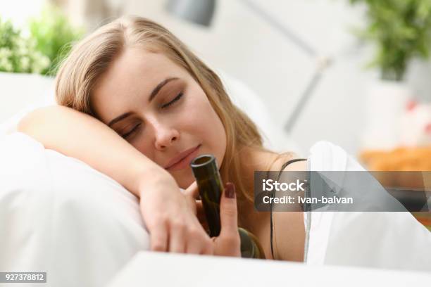 Lonely Young Woman Sleeps Early In The Morning Stock Photo - Download Image Now - Drowning, Sadness, Wine