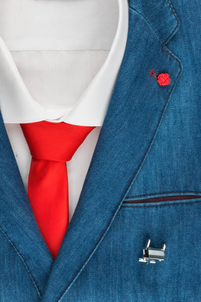 istock Classic denim suit, shirt, cufflinks and red tie, close-up. 927382810