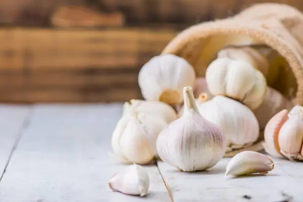 Photo of Garlic Cloves and Bulb for food cooking in the kitchen