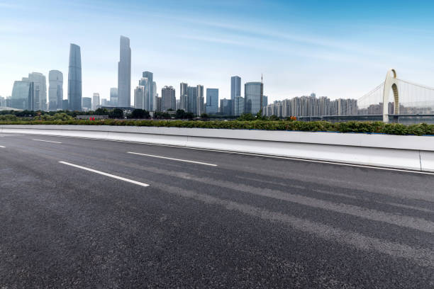 istock Highway and city modern architecture in guangzhou,china 927390874