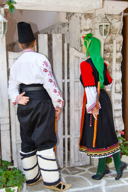 istock Folklore. Beautiful young people in folk costumes. 927390928