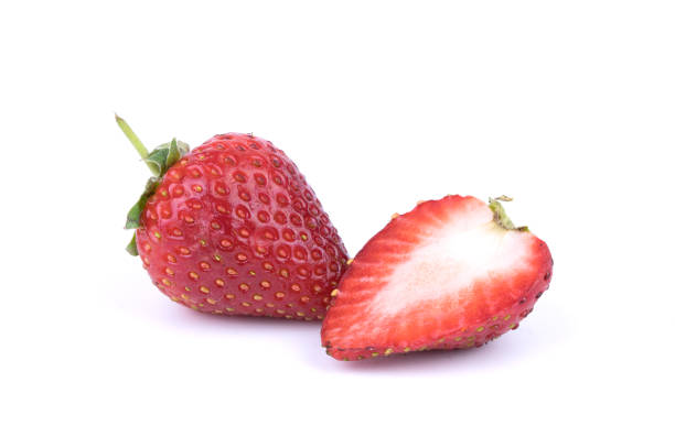 istock Perfectly retouched fresh strawberry fruit with sliced half isolated on white background. One of the best isolated strawberries you have seen. Selective focus 927393836