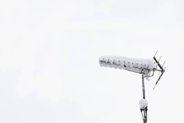 istock TV antenna cover with snow 927394438