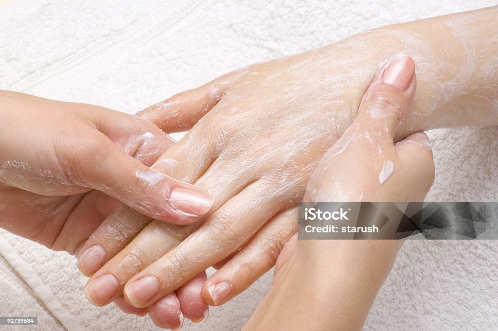 peeling or moisturizing procedure  Hand Massage Stock Photo