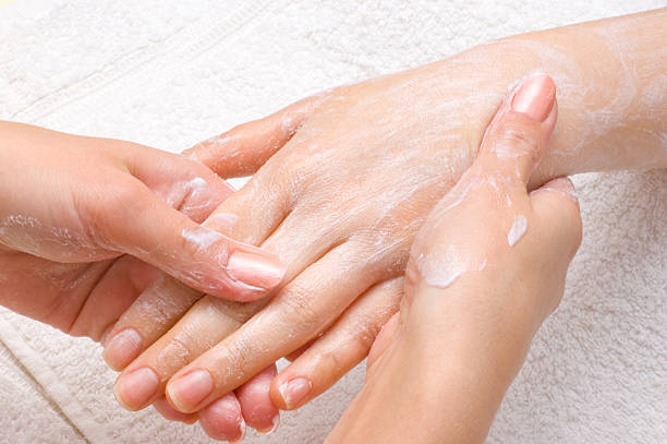 peeling or moisturizing procedure  hand massage photos stock pictures, royalty-free photos & images
