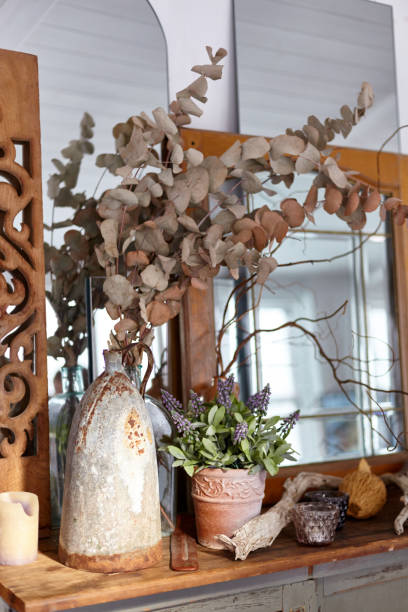 istock Old vase with a dry plant. 927397616