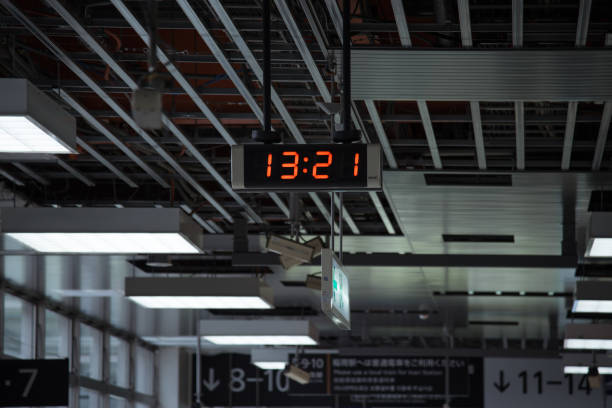 istock Close up of Digital clock in train station 927402392
