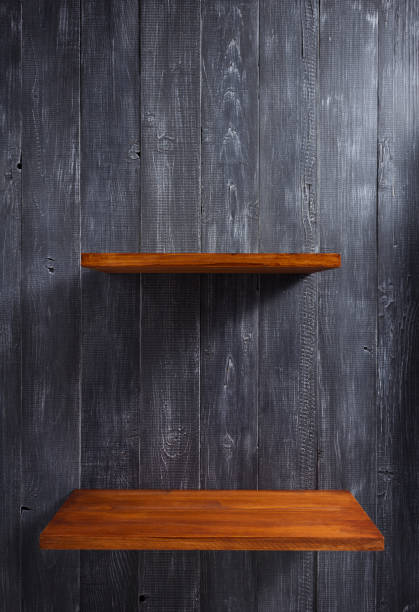istock shelf at wooden background 927402766