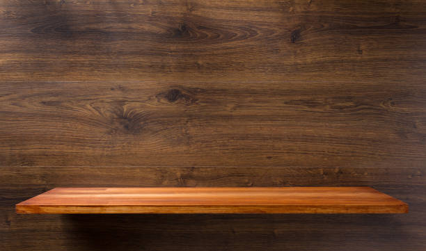 istock shelf at wooden background 927402850