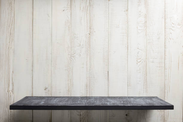 istock shelf at wooden background 927403102
