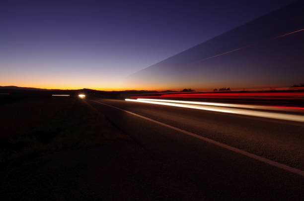night scene with lights from car traffic on the road