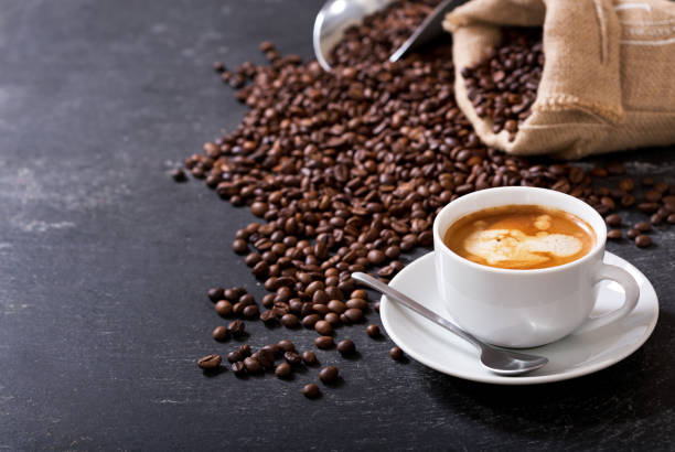 istock cup of coffee and coffee beans in a sack 927414796