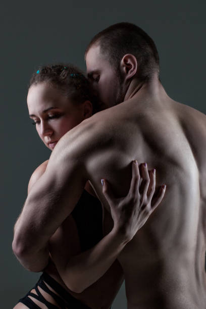 istock Man and a woman are embraced. 927418168