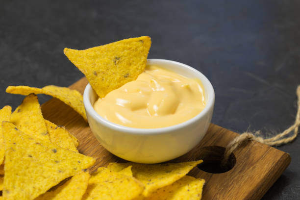 istock Nachos corn tortilla chips. Nachos with cheese. place for your text. 927421242