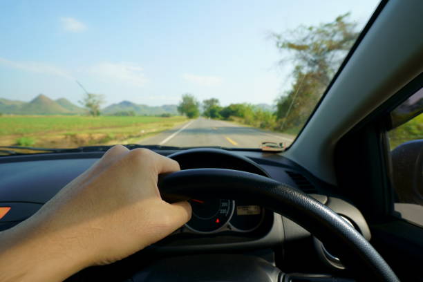 istock A man driving car on the country road 927422590