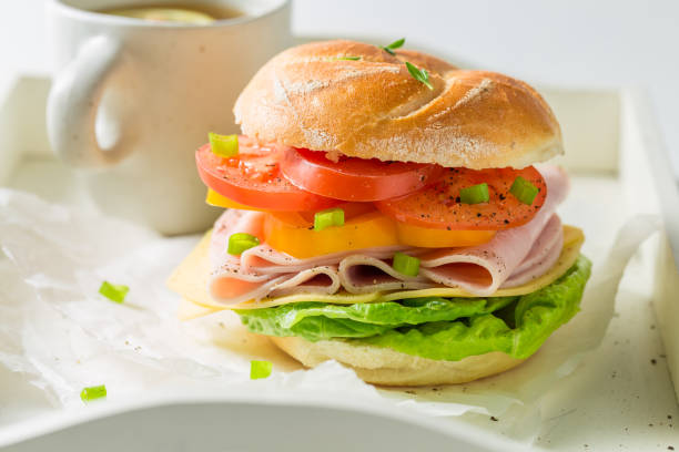 istock Crisp sandwich with fresh ingredients and tea 927423388