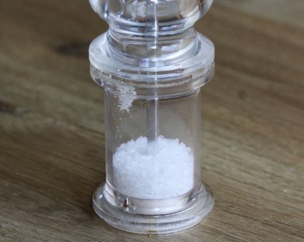istock glass salt mill set on wooden background 927426506