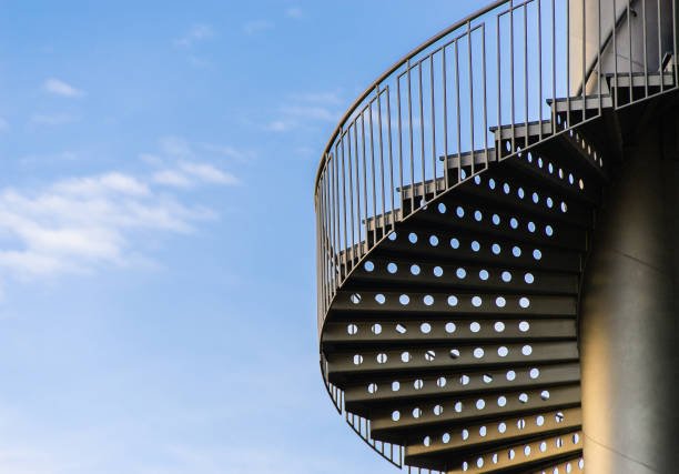along the pole there is a round staircase at the sea