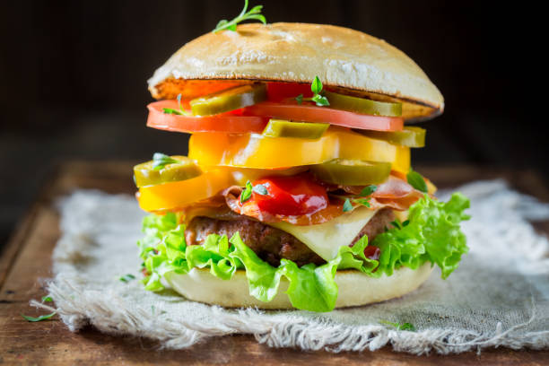 istock Spicy hamburger with becon, tomato and beef 927426614