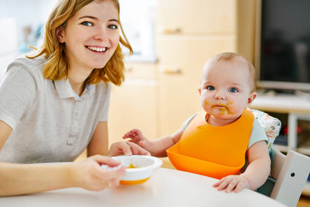 istock Mother and baby boy during feeding 927426718
