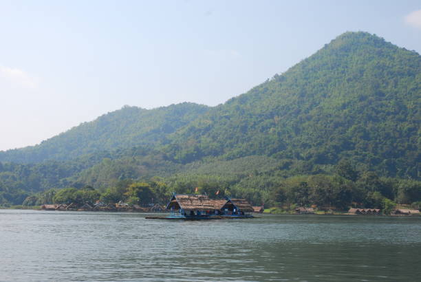 istock Beautiful mountain hill and river lake for background. 927427042