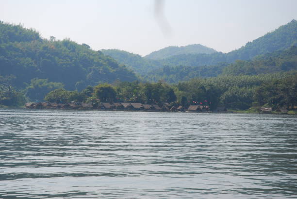 istock Beautiful mountain hill and river lake for background. 927427368