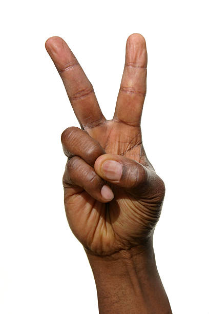 istock Man's hand in a fist with pointer and middle finger up 92743224
