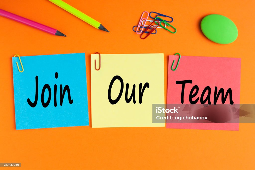 Join Our Team Concept Join our team written on color notes and office supplies. Business Concept. Top view. Help Wanted Sign Stock Photo