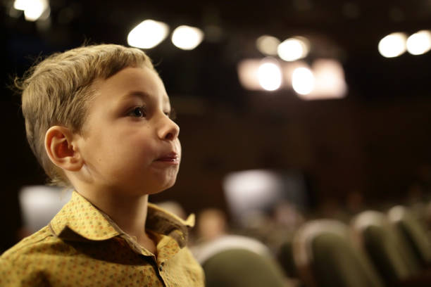 istock Child in cinema 927447304