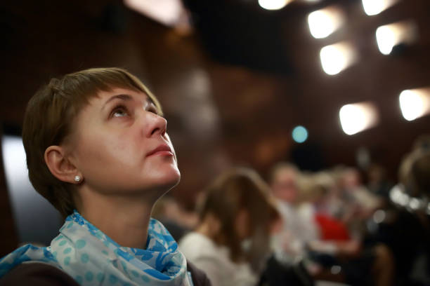istock Woman in theater 927447534