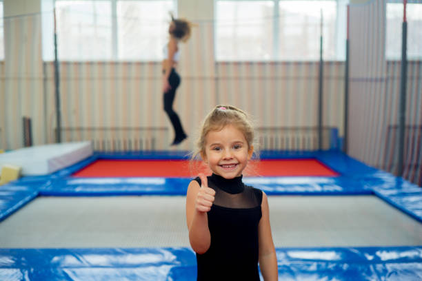istock Kids in trampoline center 927448596