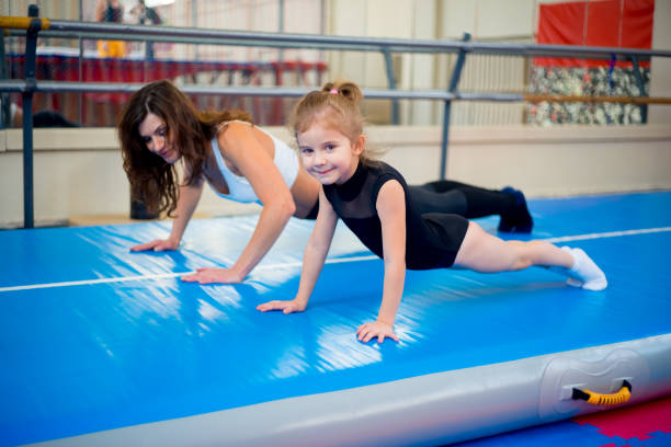istock Family in trampoline center 927451644