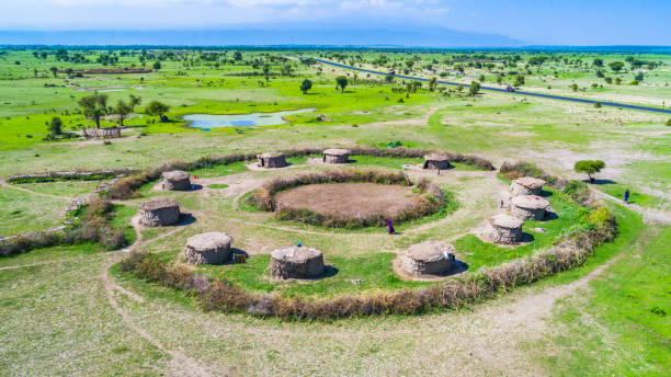 Aerial. Traditional Masai village near Arusha, Tanzania. Aerial. Traditional Masai village near Arusha, Tanzania. masai stock pictures, royalty-free photos & images