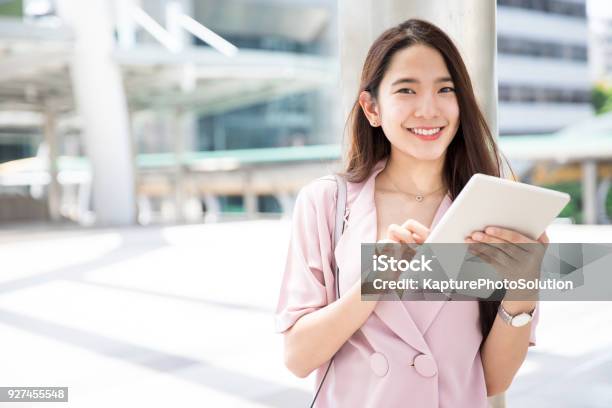 Young Asian Working Woman Getting Ready Before Meet Up With Client Stock Photo - Download Image Now
