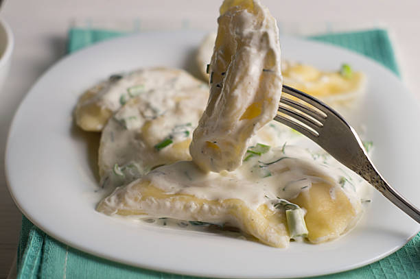 istock Dumplings with potato and fried onion 927455924