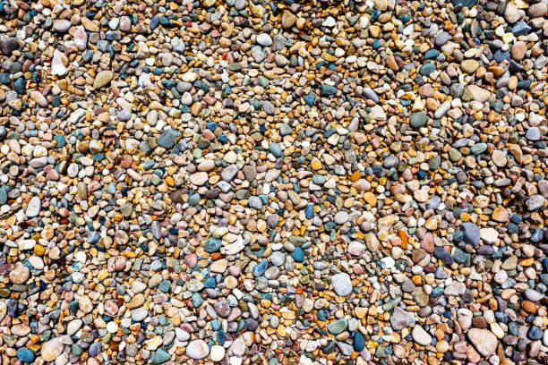 istock A close up view of smooth polished multicolored stones on the beach 927456426